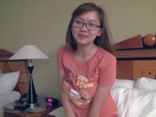 Delightful busty asian teenager fngers in glasses
