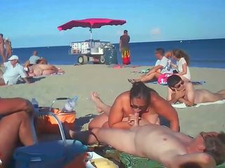Milf Blows Her beau On Nude Beach By Voyeurs