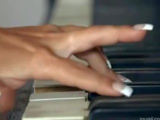 Busty blondie toying snatch on the piano