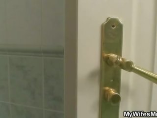 Chubby mother inlaw takes it in the bathroom